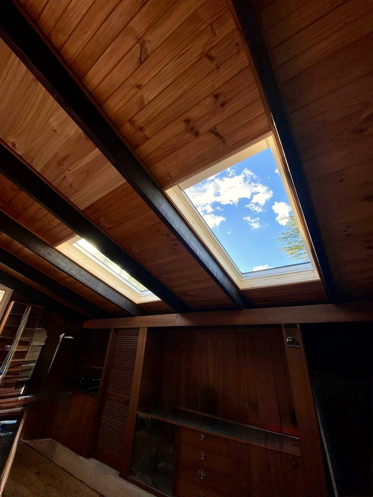 VELUX skylight in a mid-century timber-ceiling room